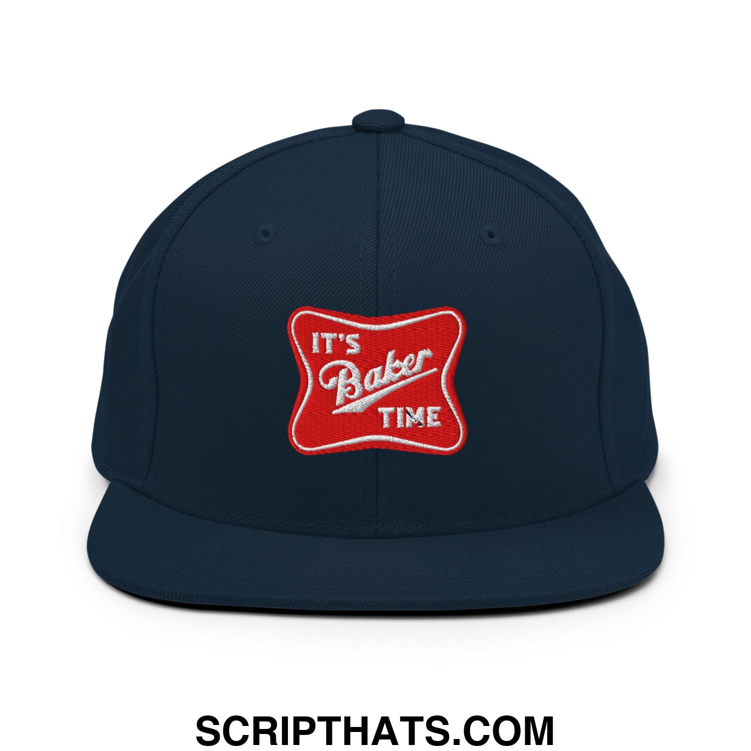 Navy blue snapback cap with flat bill brim featuring a red embroidered patch reading its baker time
