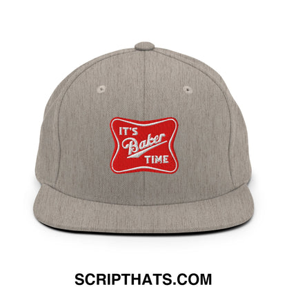 Gray snapback hat with a flat bill brim featuring a red embroidered patch that reads its baker time in white script