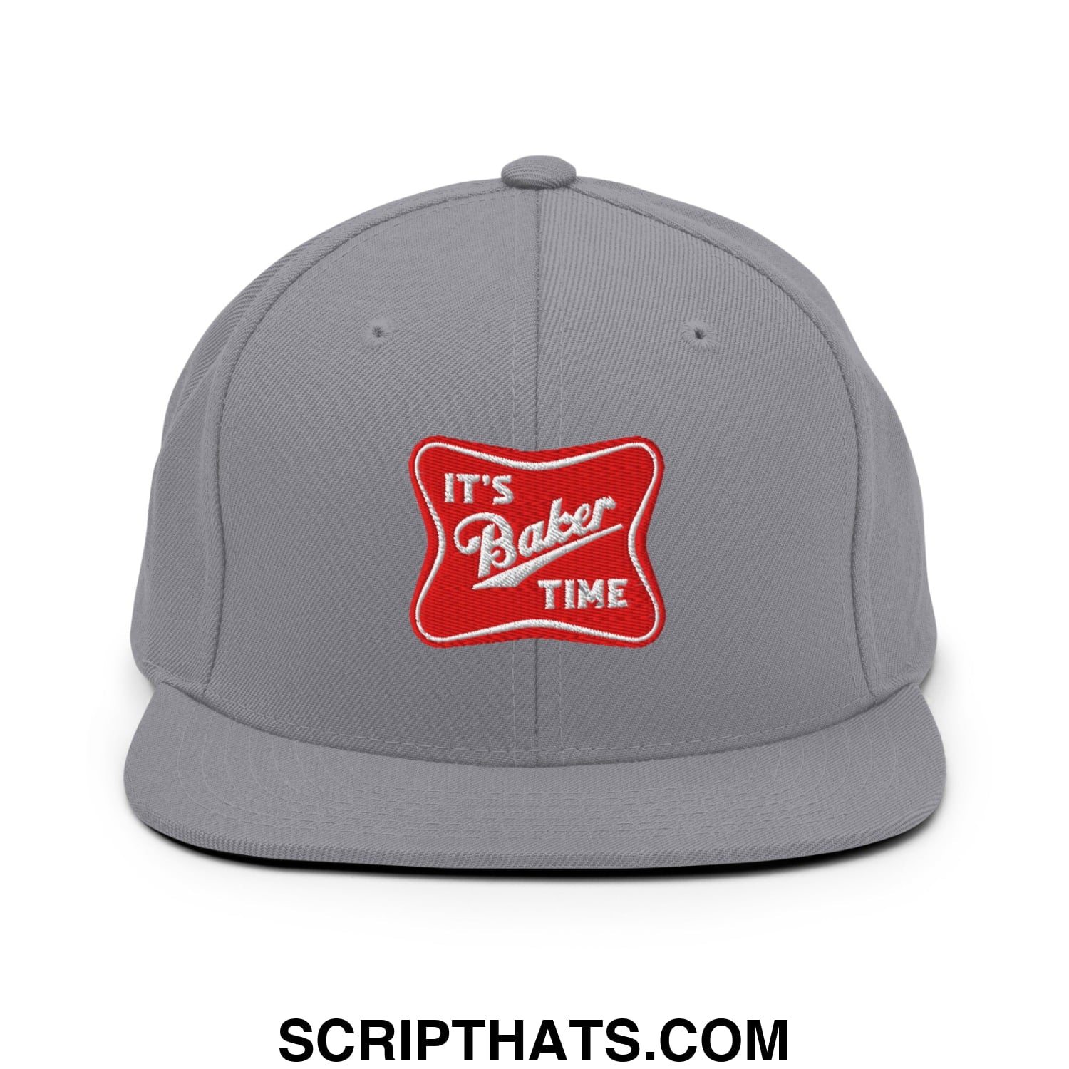 Gray snapback cap with a flat bill featuring a red embroidered patch with white text reading it’s baker time