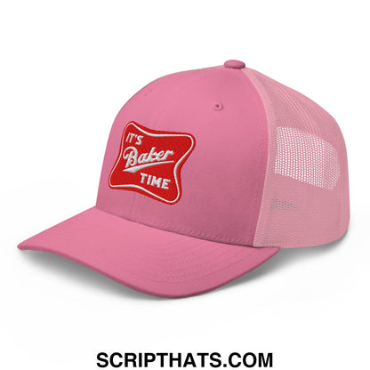 Pink mesh trucker hat with red embroidered patch reading its baker time in white script