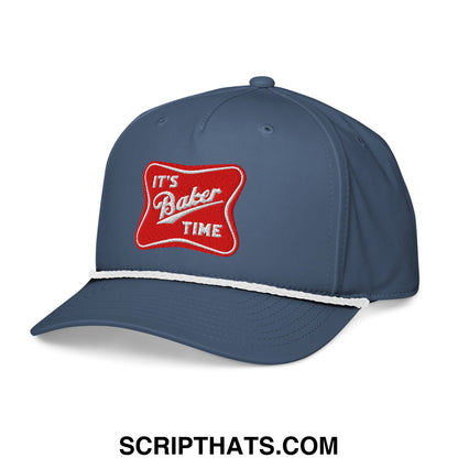 Navy blue baseball cap with red embroidered it’s baker time patch and white trim along the brim