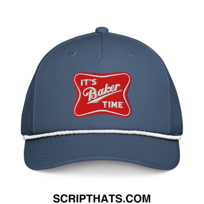 Navy blue baseball cap with a white stitched brim and a red embroidered patch reading its baker time