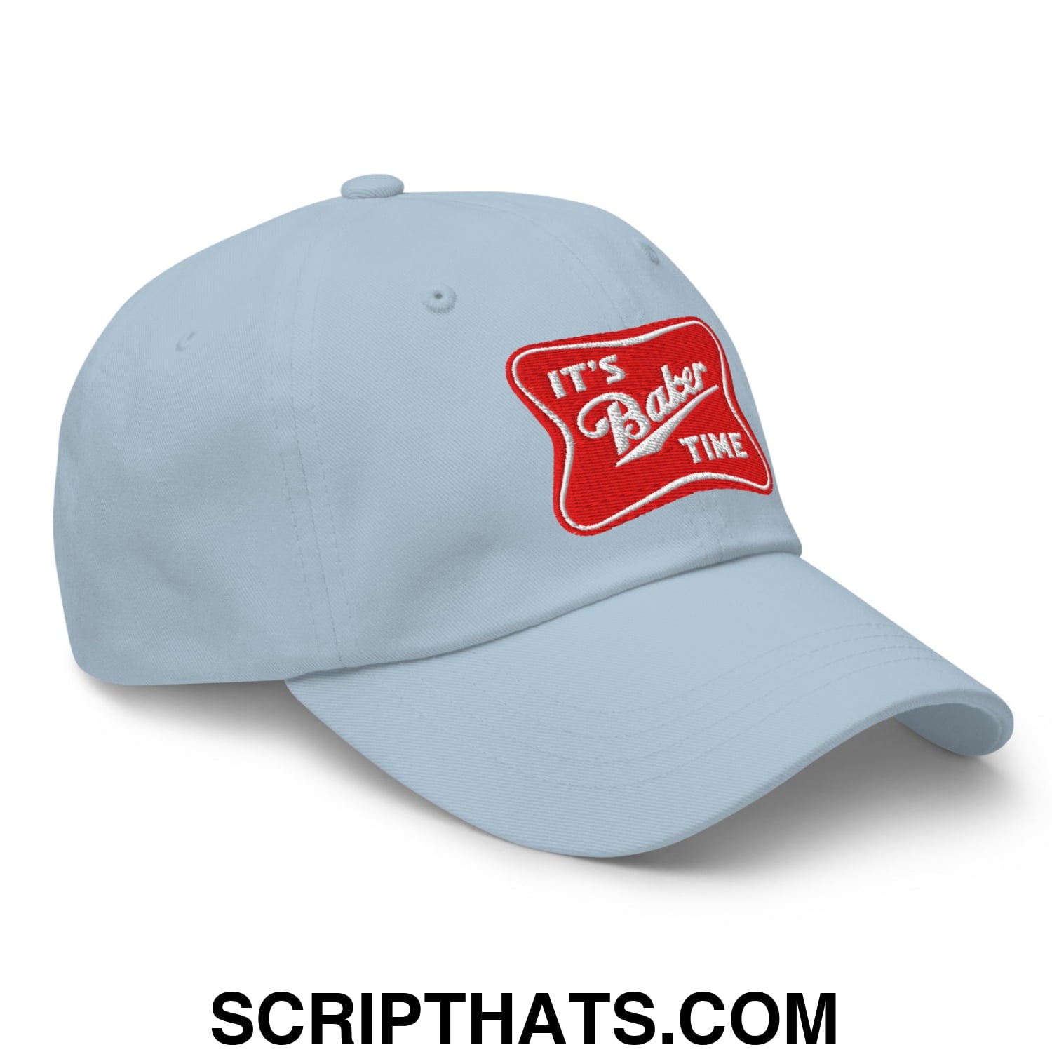 Light blue unstructured dad hat featuring a red embroidered patch with white lettering that reads its baker time