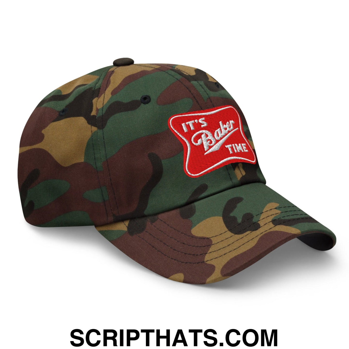 A camouflage unstructured dad hat with a red embroidered patch reading its baker time in white script