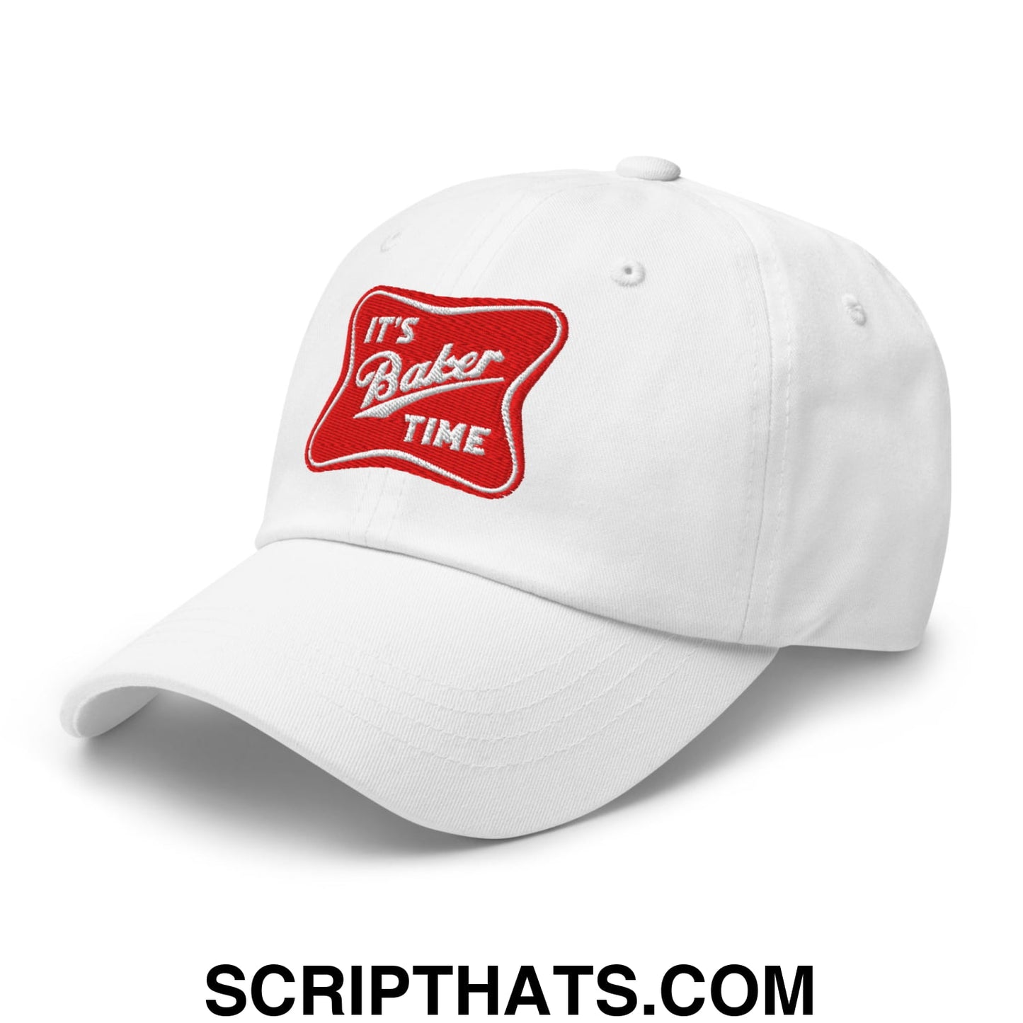 White unstructured dad hat with red embroidered patch displaying it’s baker time in white script