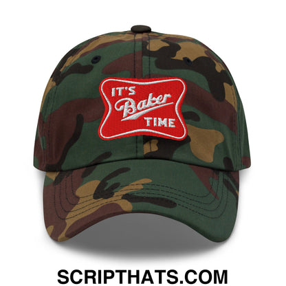 A camouflage unstructured dad hat with a red embroidered patch reading its baker time in white script