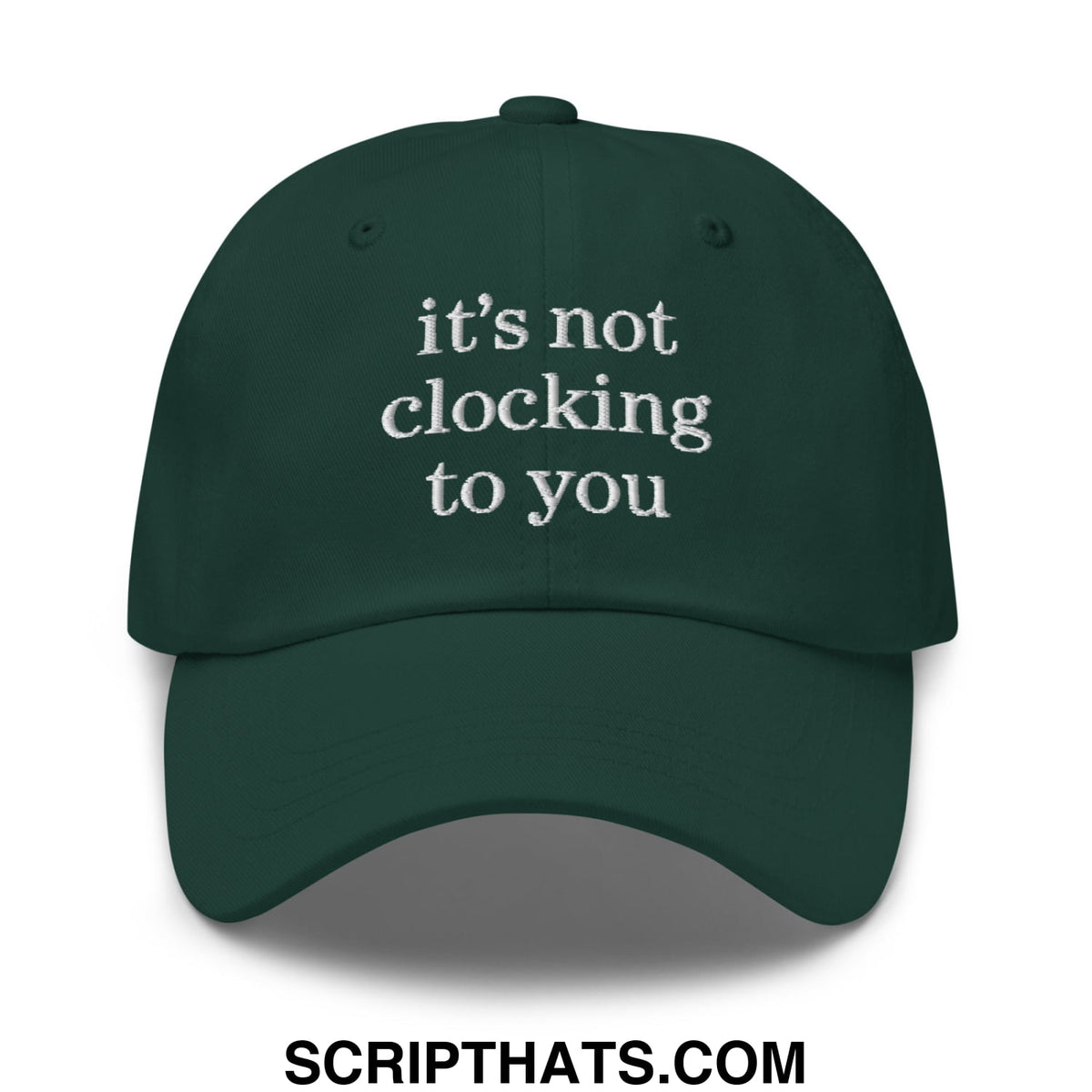 Dark green embroidered unstructured dad hat with white text reading its not clocking to you for casual wear