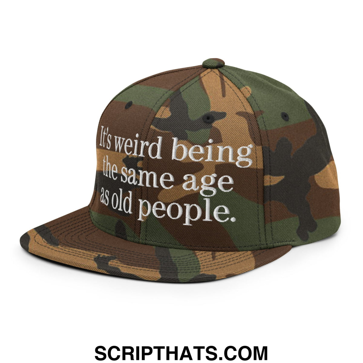 Camouflage snapback flat bill brim hat with white embroidered text reading its weird being the same age as old people