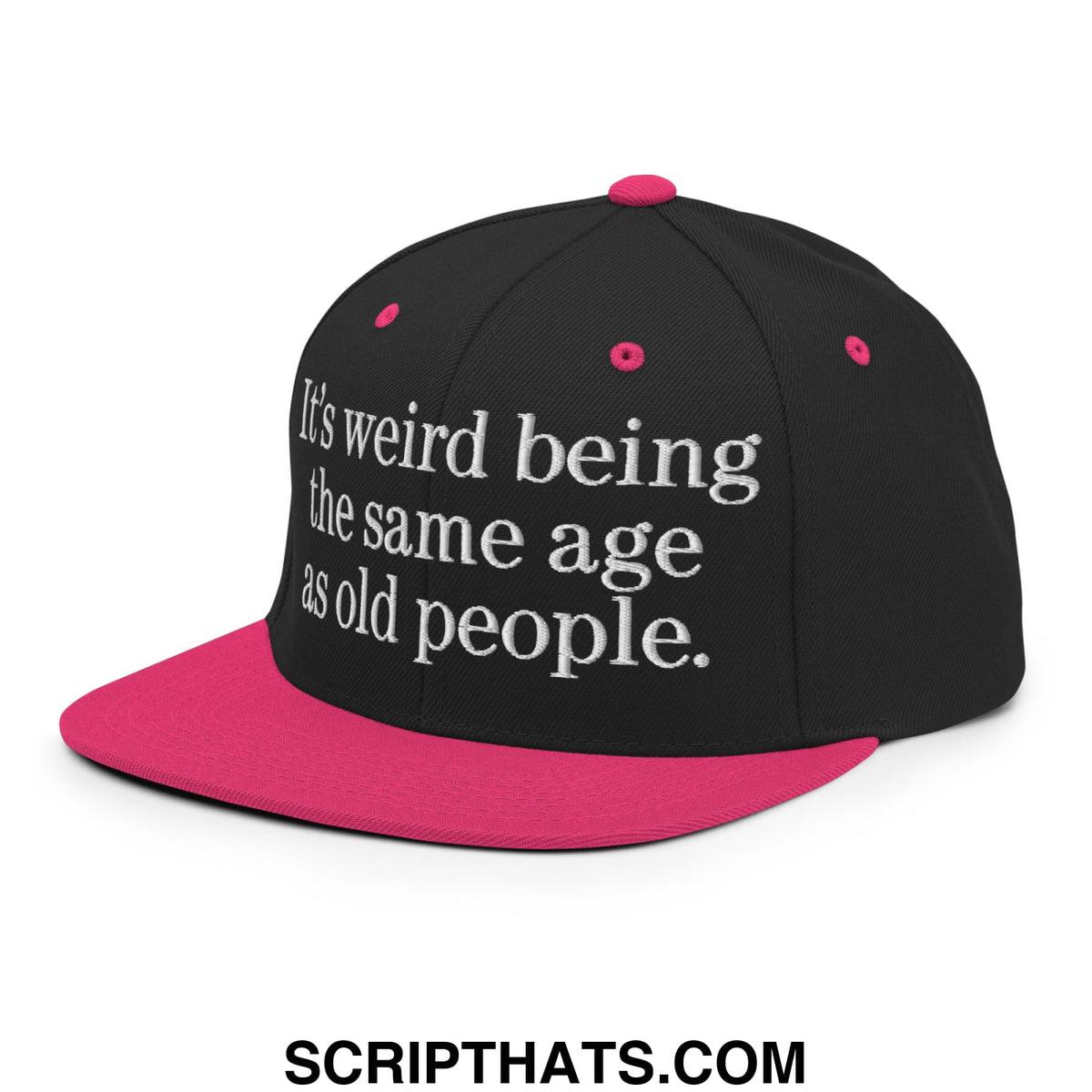 Black and pink flat bill brim snapback hat with white embroidered text reading its weird being the same age as old people
