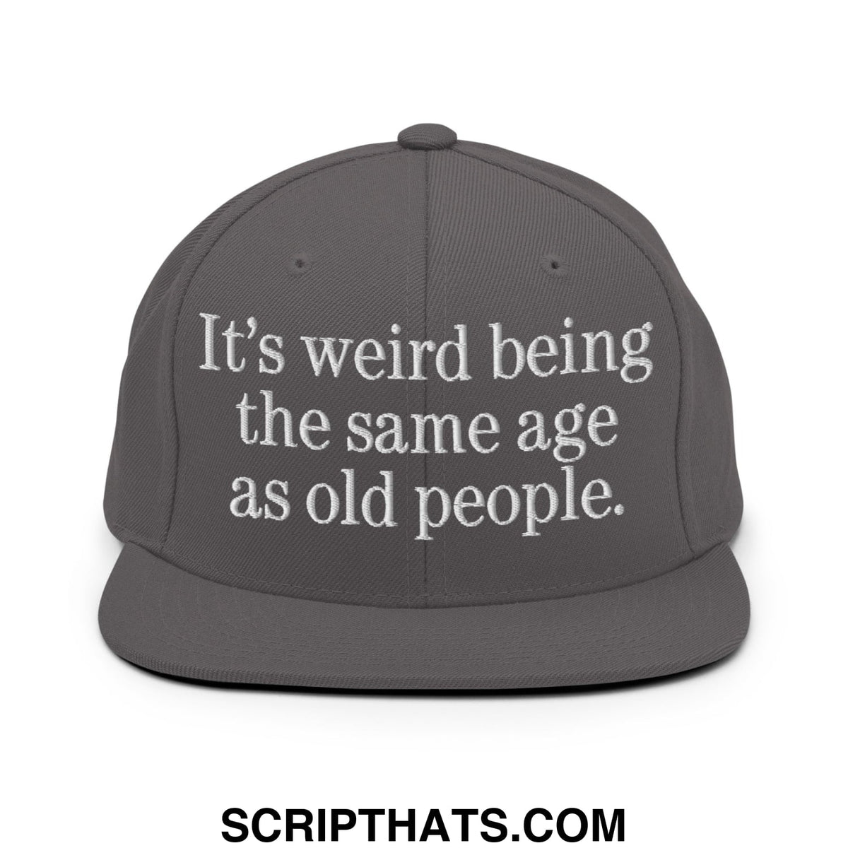 Gray embroidered flat bill snapback hat with white text reading its weird being the same age as old people