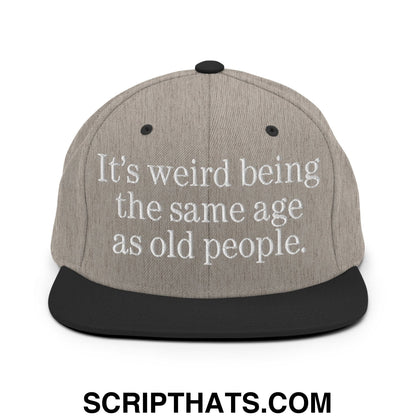 It's weird being the same age as old people. Embroidered Flat Bill Brim Snapback Hat Heather Black