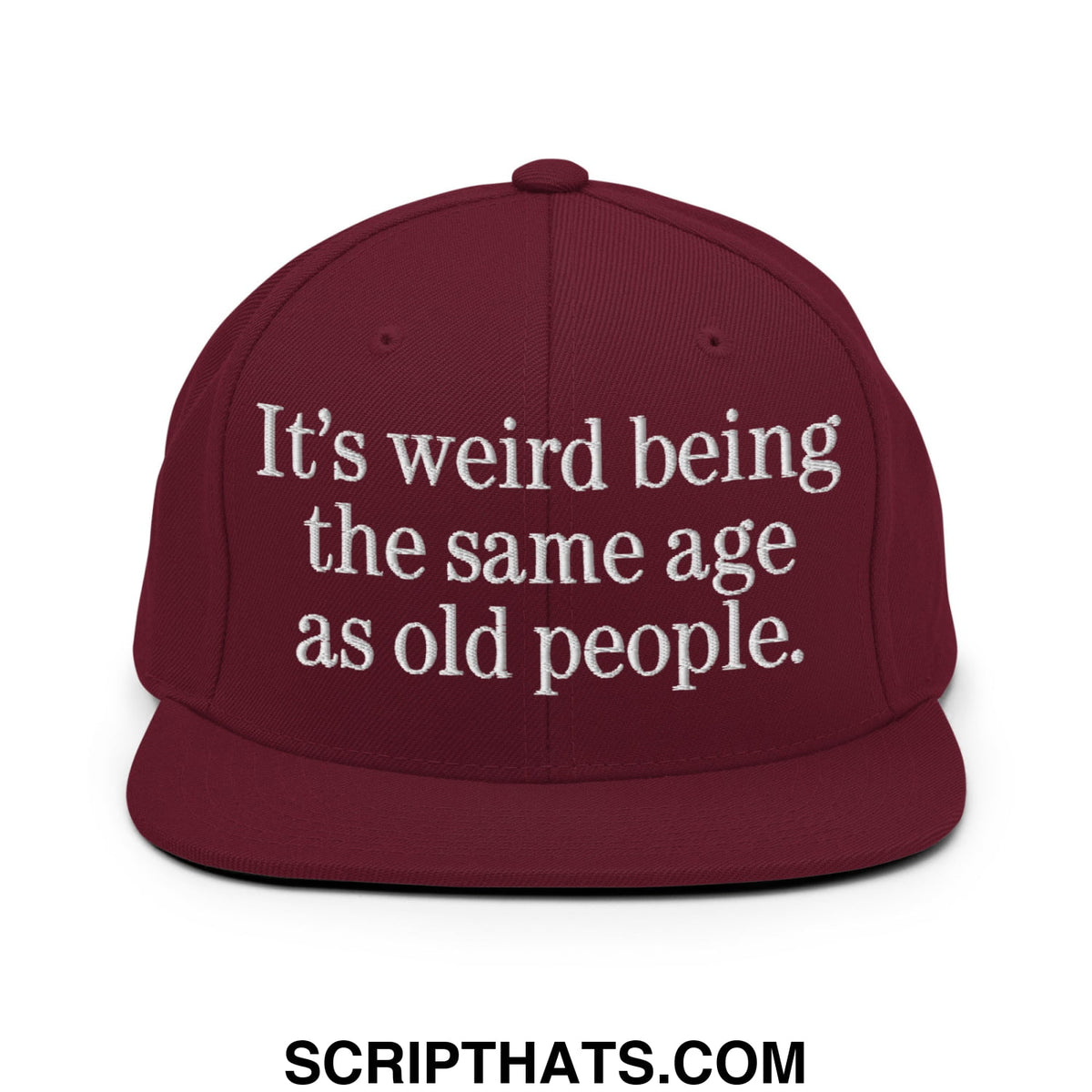 Maroon flat bill brim snapback hat with white embroidered text its weird being the same age as old people