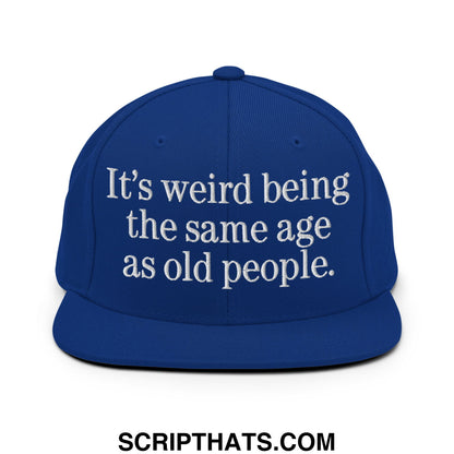 Royal blue flat bill brim snapback hat with white embroidered text its weird being the same age as old people