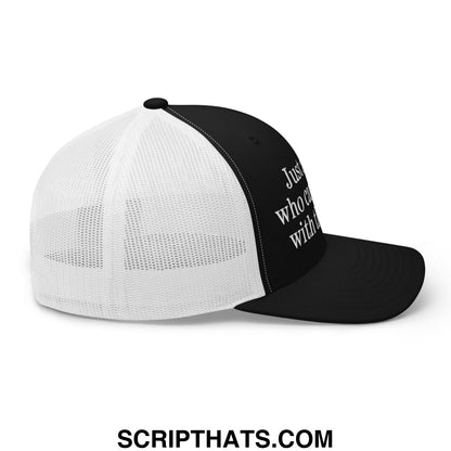 Black and white embroidered mesh trucker hat with just a dad who came back with the milk text on front panel