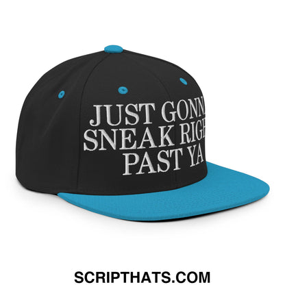 Black snapback cap with teal flat bill brim and button featuring white embroidered just gonna sneak right past ya text