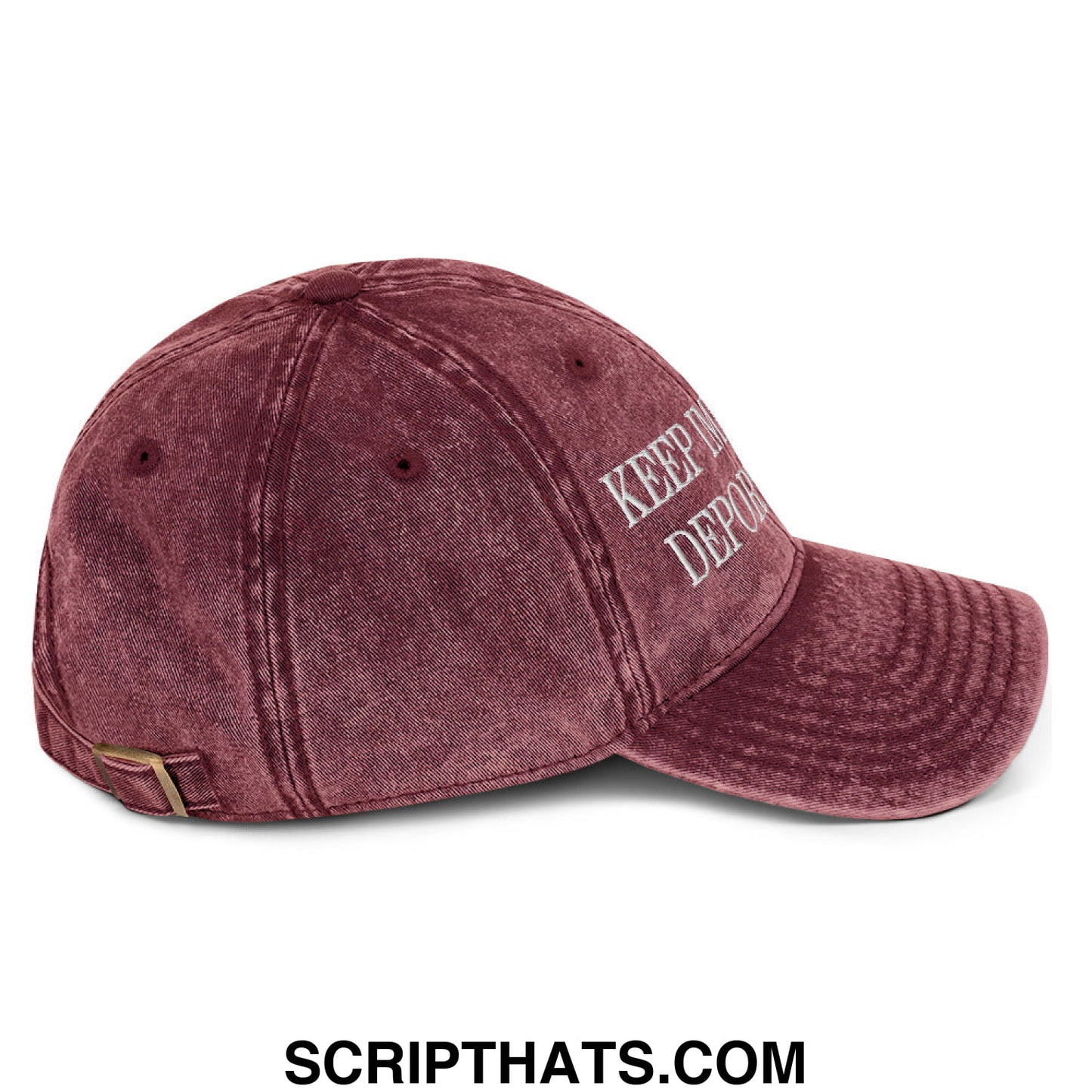 A maroon distressed denim dad hat with white embroidered keep it depo text from keep immigrants deport racists collection