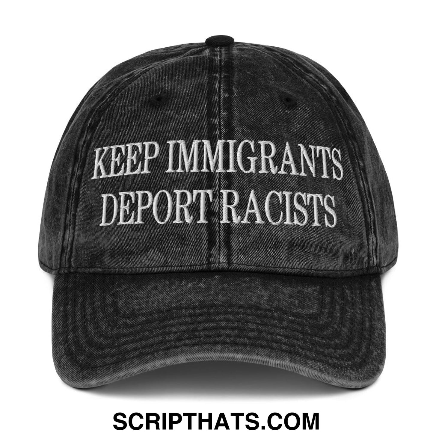 A black distressed denim dad hat embroidered with keep immigrants deport racists text in white thread