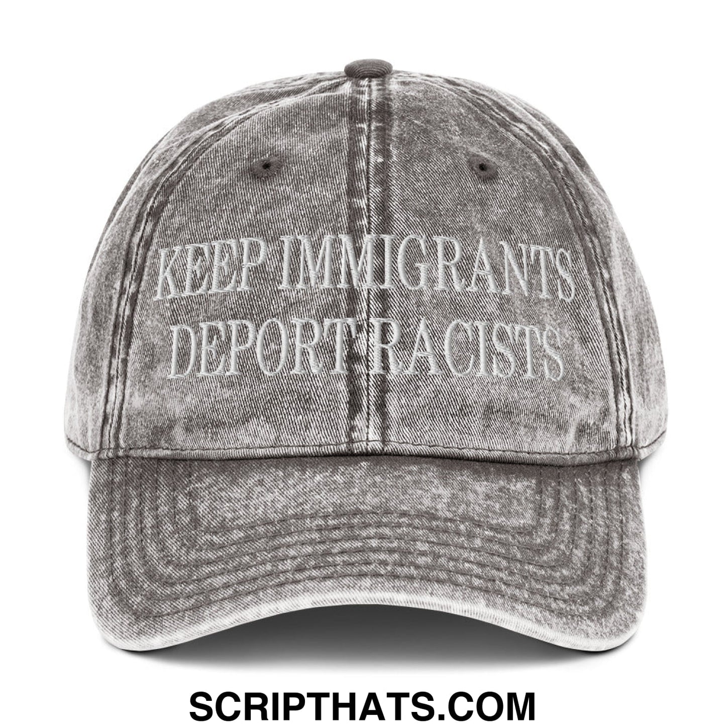 A faded gray denim dad hat embroidered with white text keep immigrants deport racists for casual wear