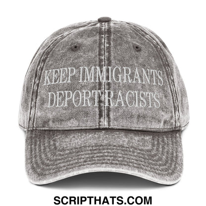 A faded gray denim dad hat embroidered with white text keep immigrants deport racists for casual wear