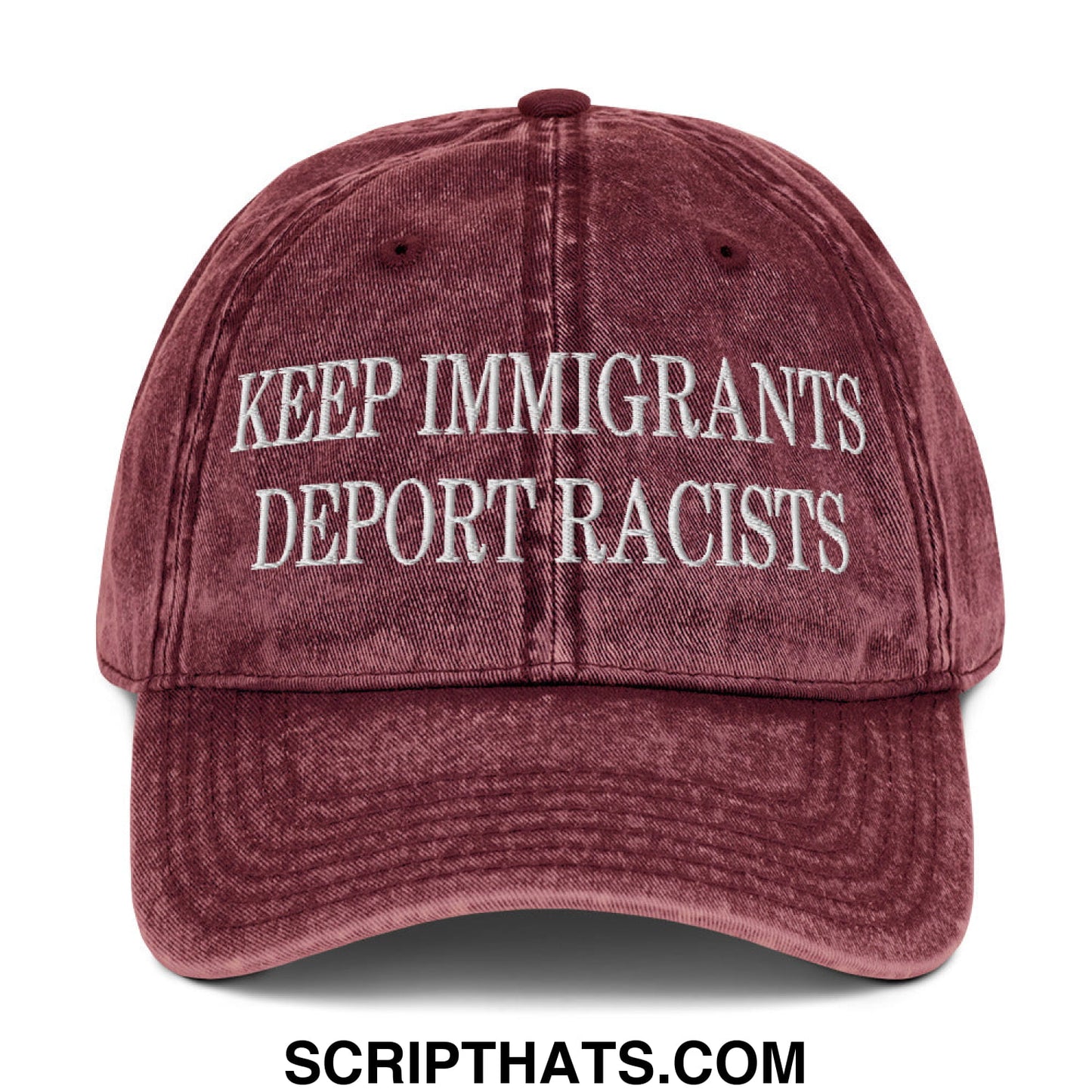 Maroon distressed cotton baseball cap with white embroidered text keep immigrants deport racists in denim dad hat style