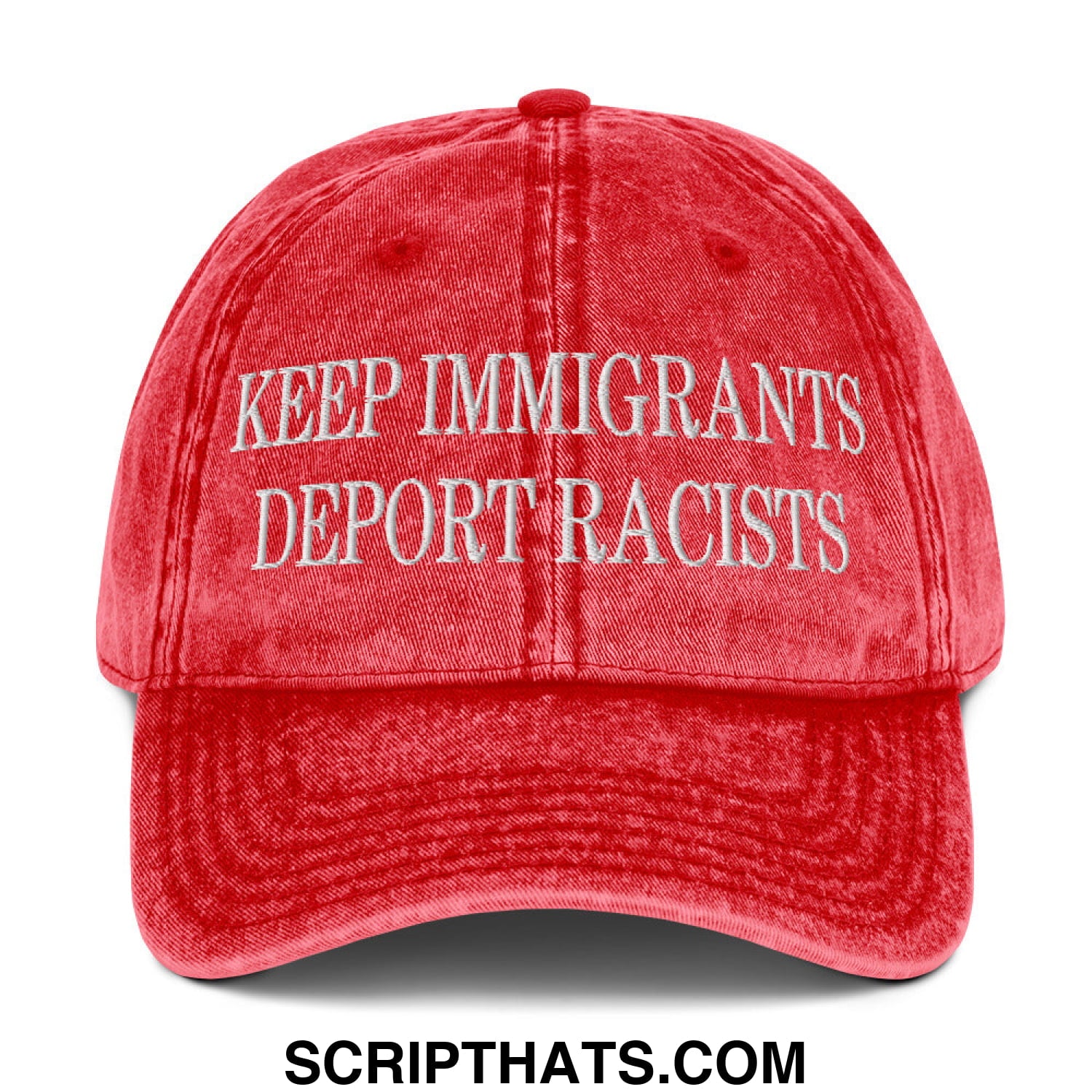 A faded red denim dad hat with white embroidered text keep immigrants deport racists on the front