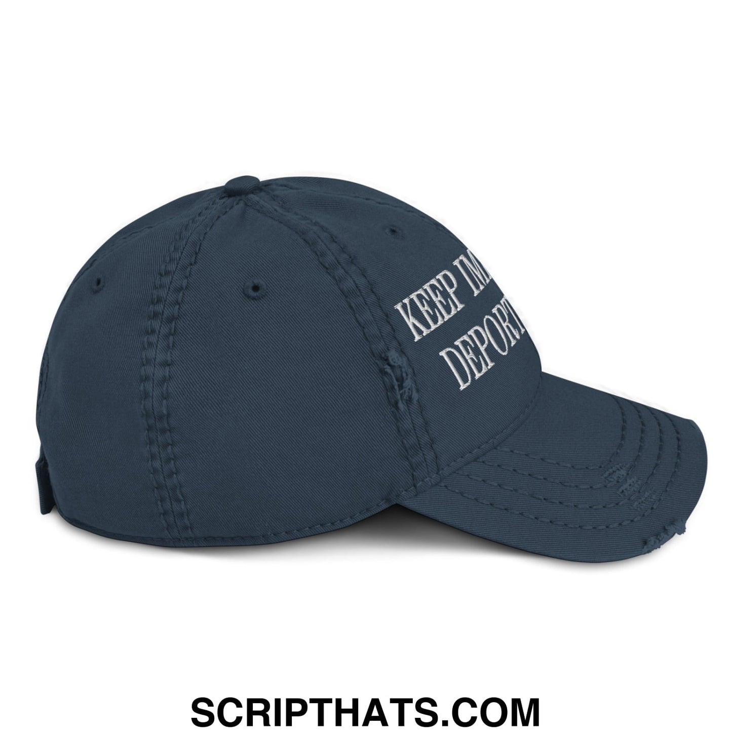 Dark blue distressed dad hat with white embroidered text keep im deport on the side for keep immigrants deport racists campaign