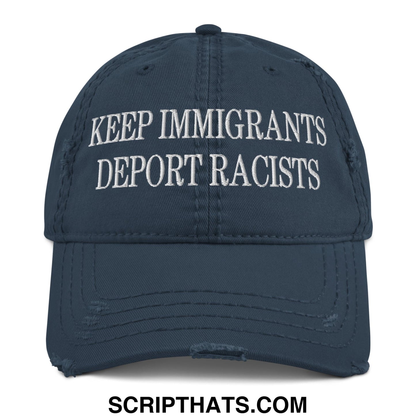 Dark blue distressed baseball cap with white embroidered text keep immigrants deport racists in a dad hat style