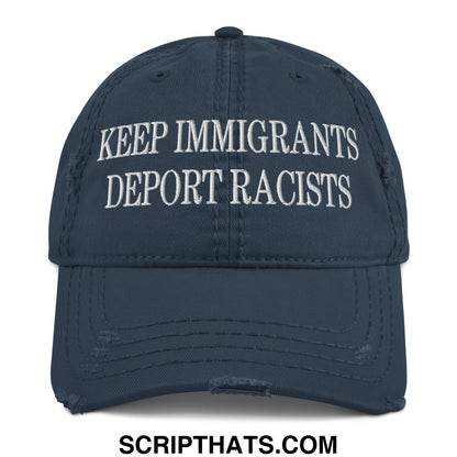 Dark blue distressed baseball cap with white embroidered text keep immigrants deport racists in a dad hat style