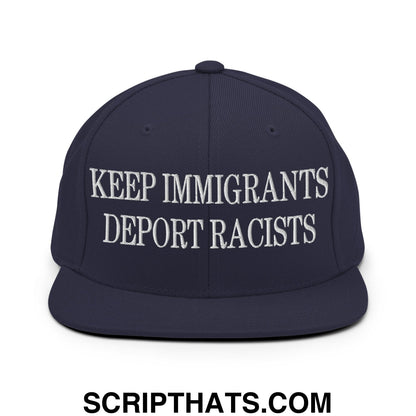 Navy blue flat bill snapback hat with white embroidered text keep immigrants deport racists for casual wear