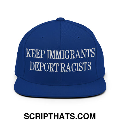 Royal blue snapback cap with white embroidered keep immigrants deport racists text on flat bill brim