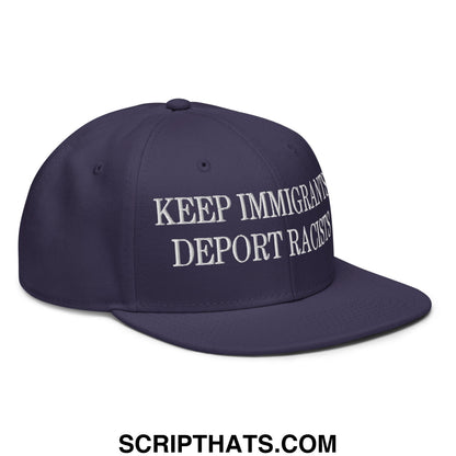 Navy blue snapback cap with white embroidered keep immigrants deport racists text and flat brim bill design