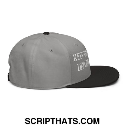 Gray and black snapback hat with white embroidered keep in deport text on the side for immigrant rights activism