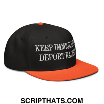 Black and orange snapback hat with white embroidered keep immigrants deport racists text on front flat brim bill