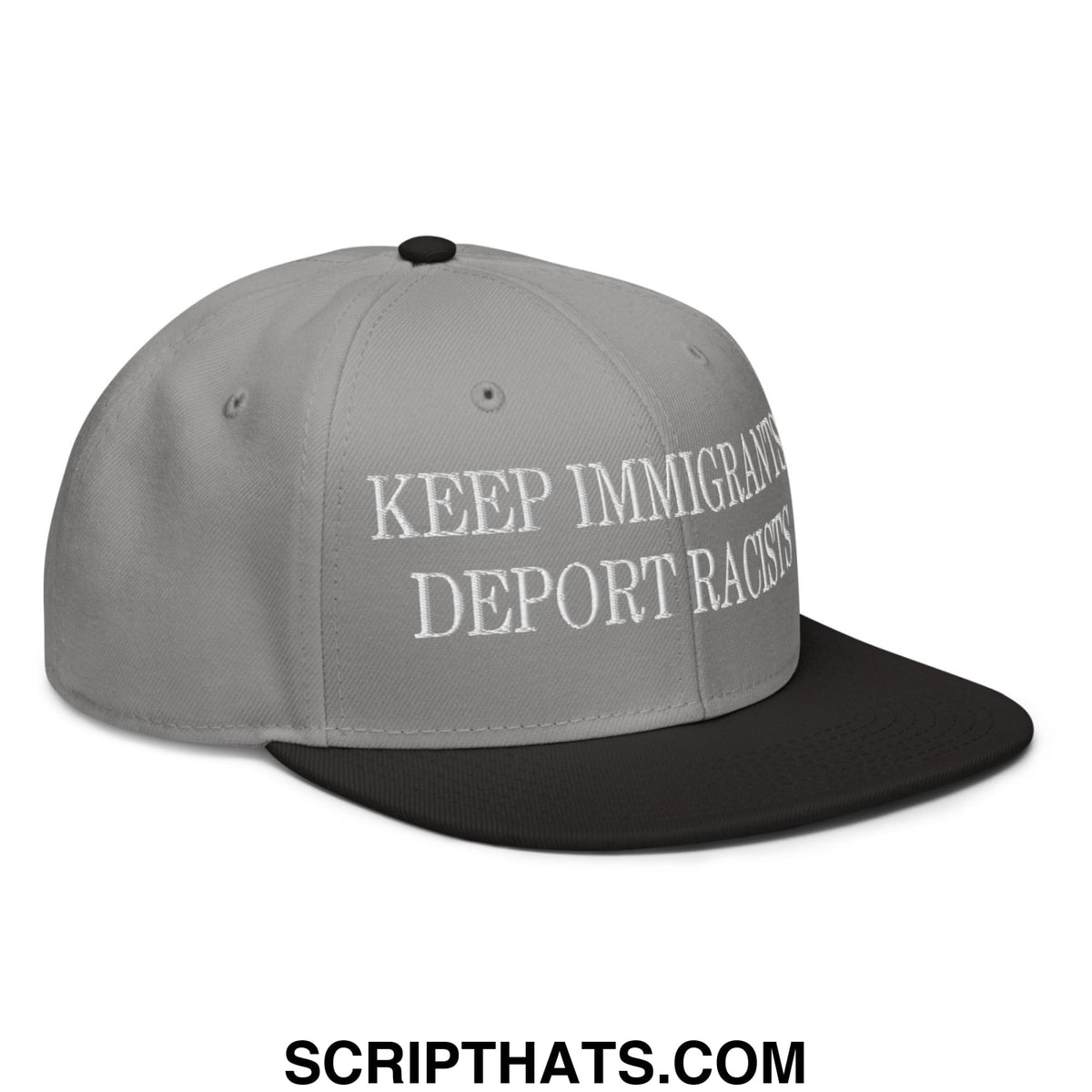 Gray snapback cap with black brim and white embroidered text reading keep immigrants deport racists flat bill hat