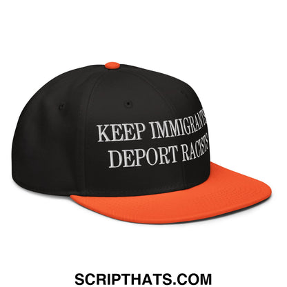 Black and orange snapback hat with white embroidered keep immigrants deport racists text on front flat brim bill