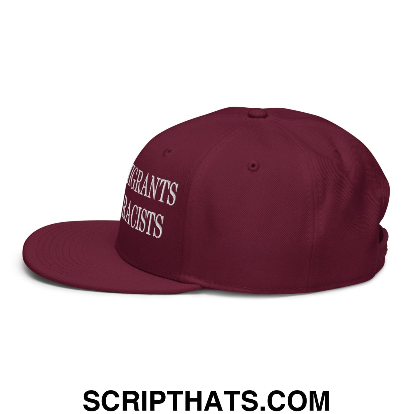 Maroon snapback hat with white embroidered text migrants not racists on the side flat brim bill style