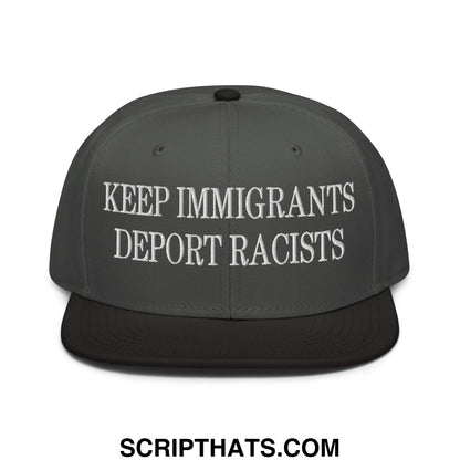 Dark gray snapback hat with white embroidered keep immigrants deport racists text on flat brim bill