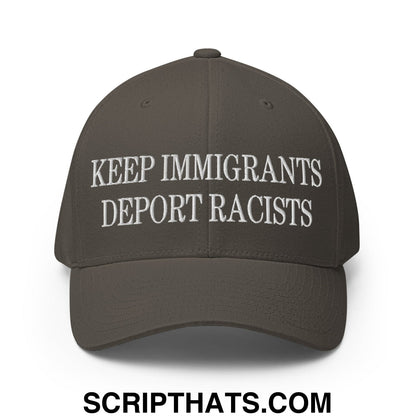 Olive green stretch fit baseball hat with white embroidered keep immigrants deport racists text on front