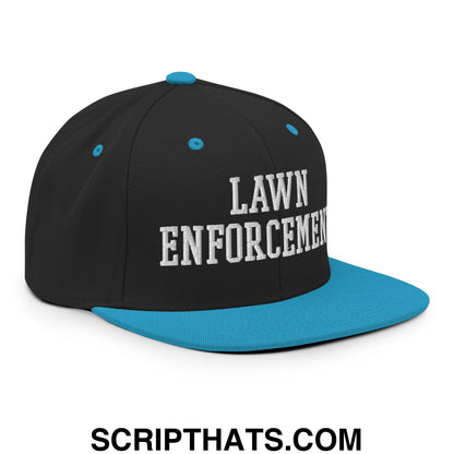 Black snapback hat with teal flat bill brim and button featuring white embroidered lawn enforcement text