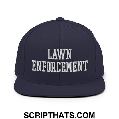 Navy blue snapback hat with white embroidered lawn enforcement text and flat bill brim for casual wear