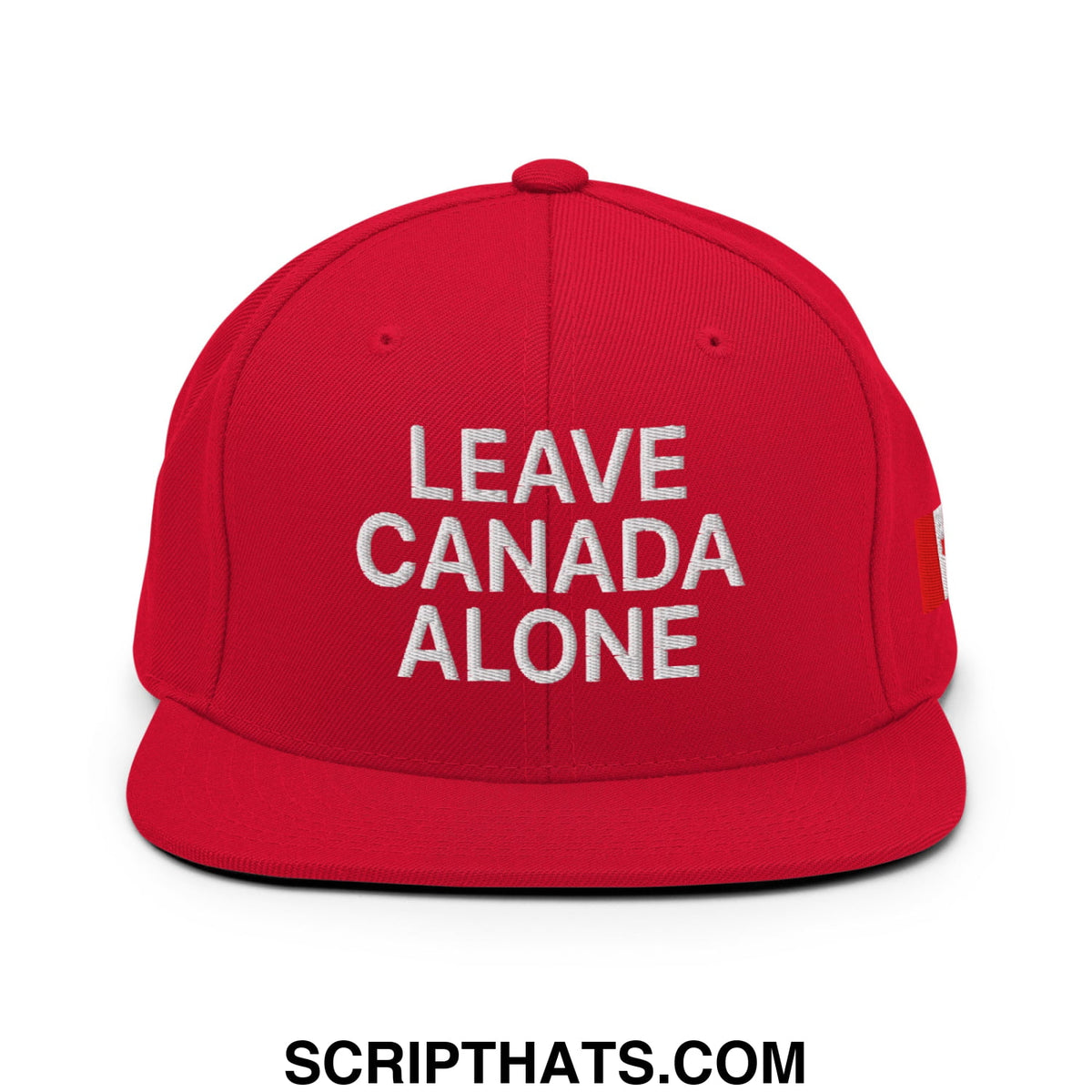 Red snapback cap with white embroidered leave canada alone text and small red logo on the side flat bill brim hat