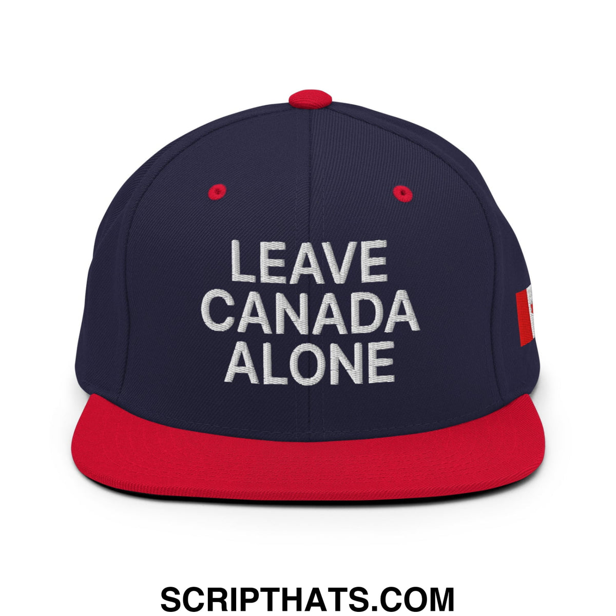 Navy blue and red snapback hat with white leave canada alone embroidery and canadian flag patch on the side