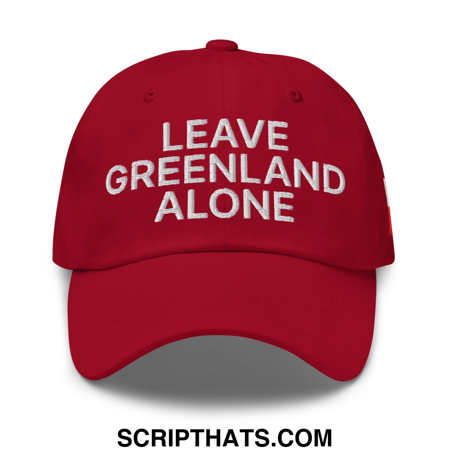 Red embroidered unstructured dad hat with white leave greenland alone text for casual wear