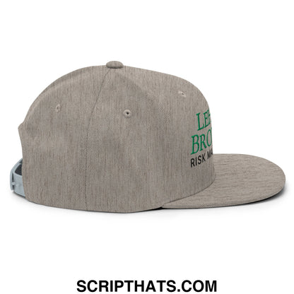 A heather gray Lehman Brothers risk management snapback hat with green embroidered text and flat bill brim