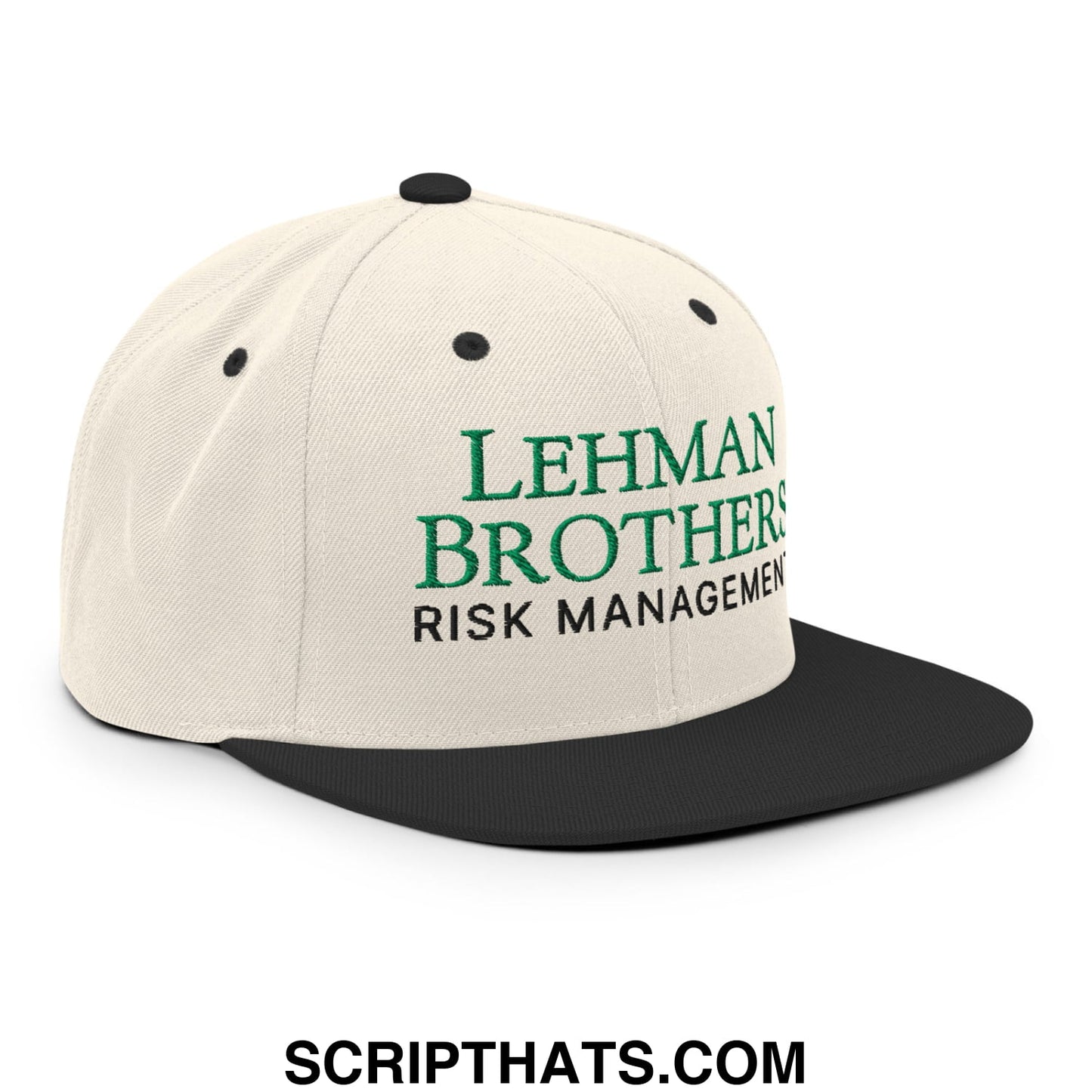 Cream-colored snapback hat with black flat brim and green embroidered Lehman Brothers risk management text