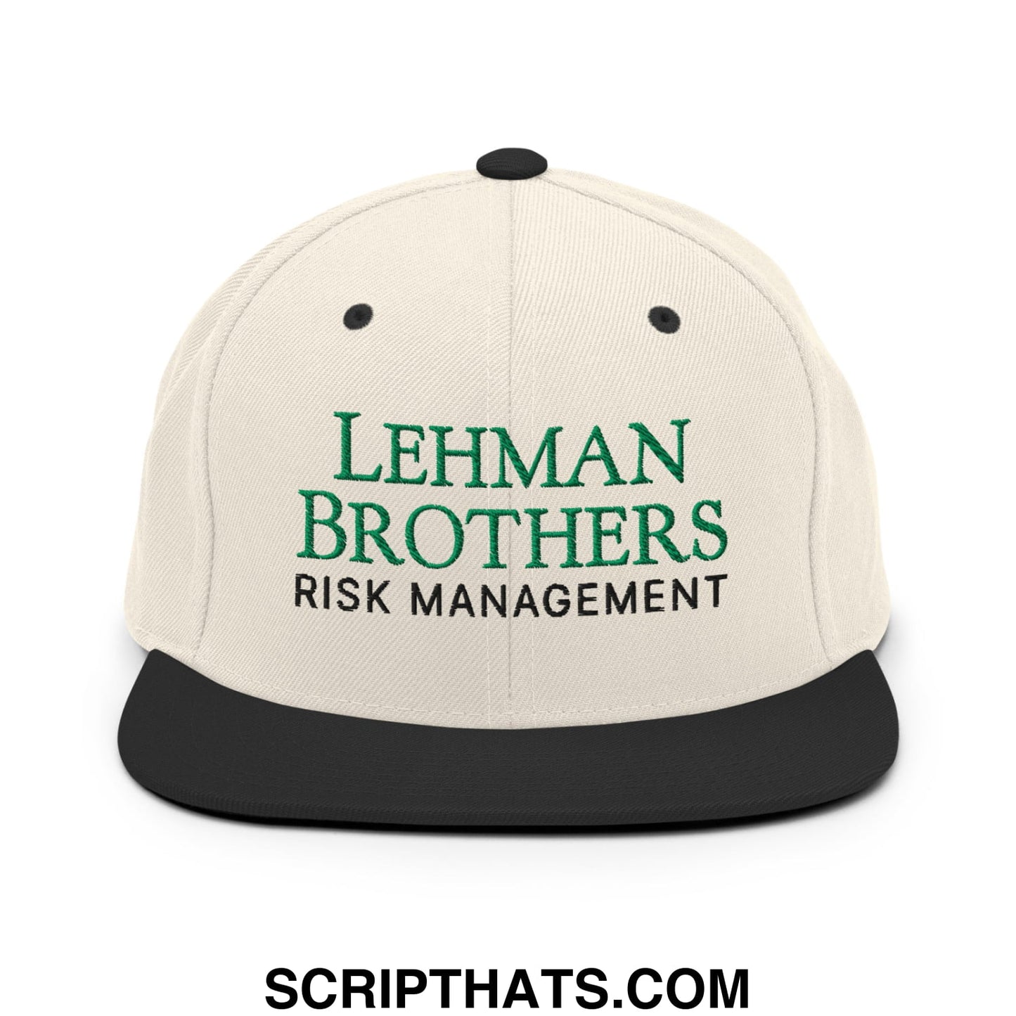 Cream-colored snapback hat with black brim embroidered with green lehman brothers and black risk management text