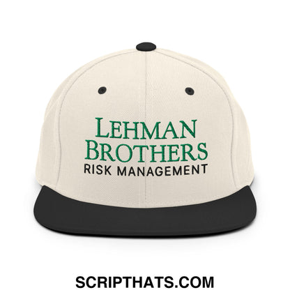 Cream-colored snapback hat with black brim embroidered with green lehman brothers and black risk management text