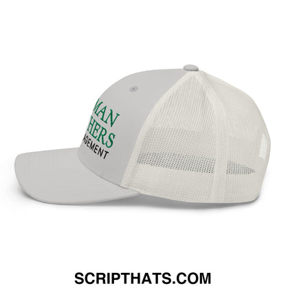 White trucker style cap with mesh back and green embroidered lehman brothers risk management text on front panel
