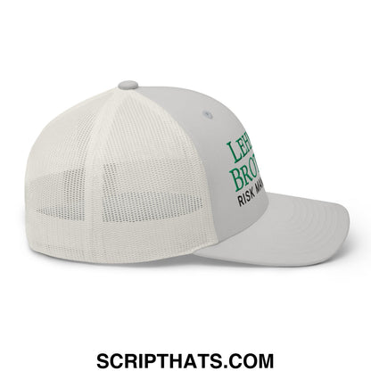 A light gray mesh trucker hat with embroidered green lehman brothers risk management text on the front panel