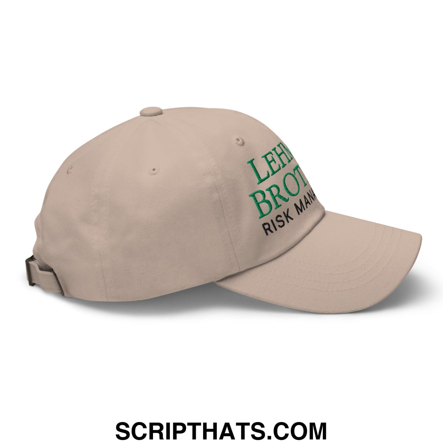 Beige unstructured dad hat with green embroidered lehman brothers risk management text on the front